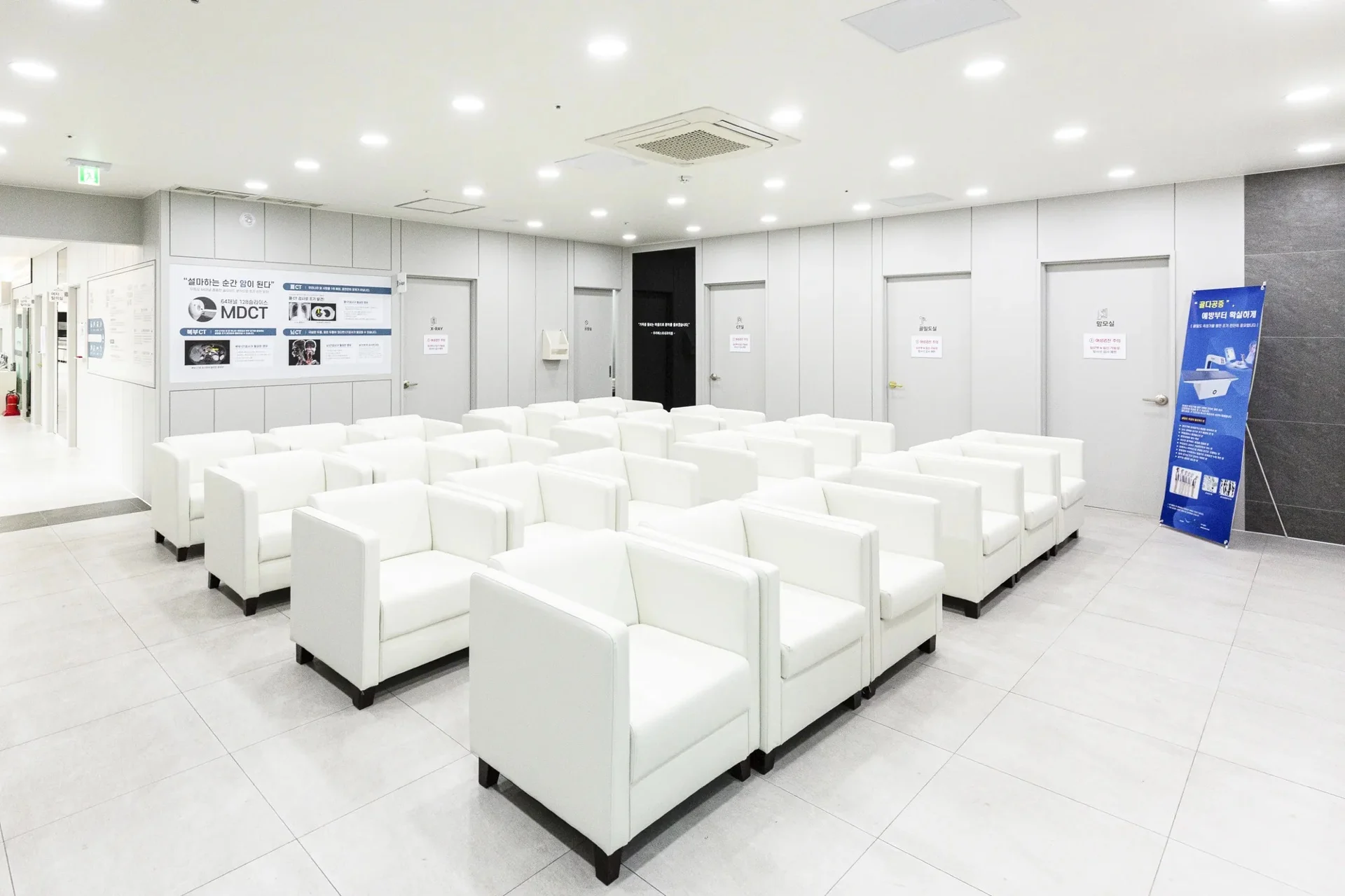 Bright waiting area with white armchairs at LifeOne Health Check-up Center in Incheon